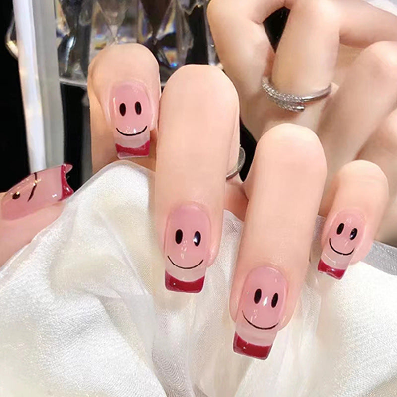 24Pcs Pink Beautiful Smile Face Trendy Fake Nails (With Glue) Set For Girls - Wearable Nails Stylish Pattern Artificial Nails For Women